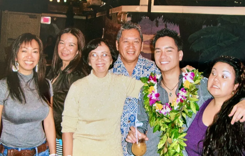 formal group with lei, cocktail indoors